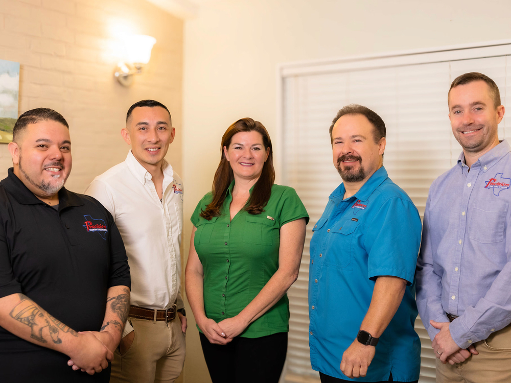 Doctors of Audiology welcoming a new patient at Precision Hearing in San Antonio, TX